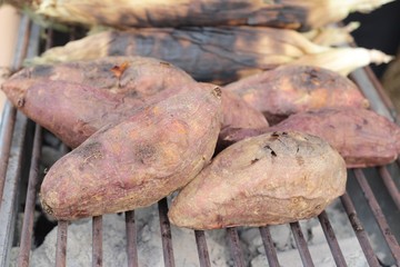Yams Burn, Sweet Potato on stove grille.