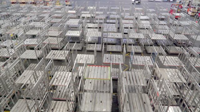 803_Hundreds_of_steel_carts_on_the_floor_in_the_building.mov
