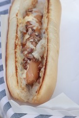 Grilled sausage with bread and tomato delicious.