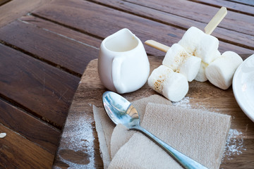 Grilled marshmallow on table  