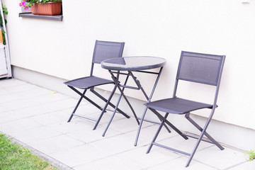 Two chair and table in hause terrace.