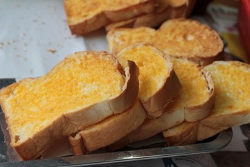 Bread toast with butter and sugar delicious.