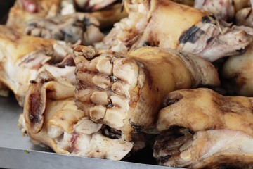 raw pork foot for cooking in market .
