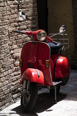Fototapeta premium Red scooter motorcycle in Italy