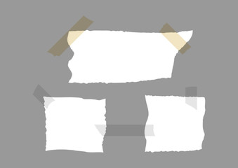 Set of torn paper with pieces of adhesive tape.