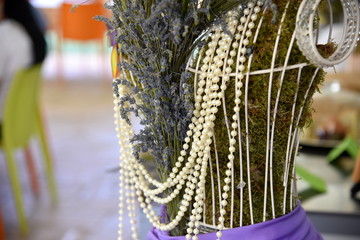 lavender and moss in metal mannequin 