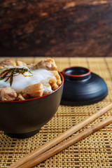 Oyakodon with raw egg on top , Japanese food