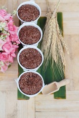Flax seeds for health on wood background.