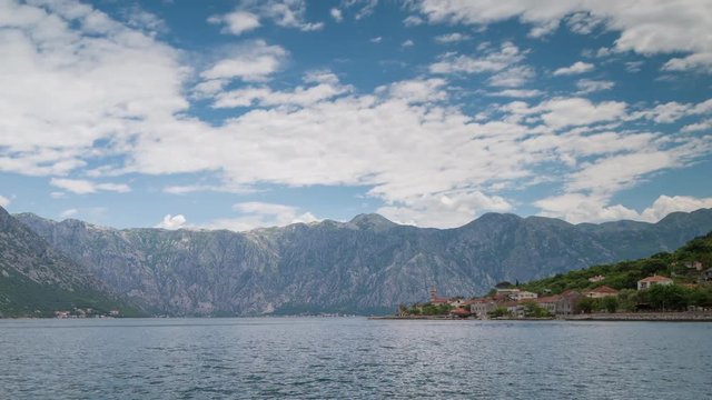 timelapse of the beautiful bay of kotor in montenegro where mountains reach crystal clear waters