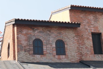 Old building windows and brick wall vintage style.