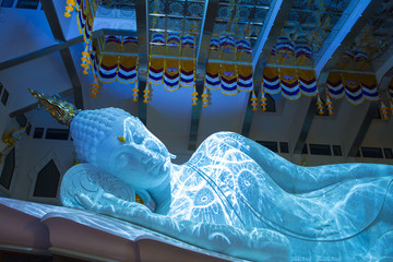 Sleeping Buddha image inside Wat Pa Phu Kon in Udon Thani, Thailand.