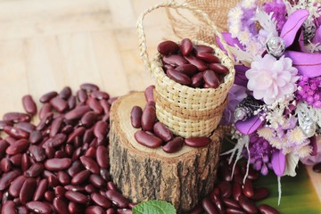 Red bean for health on wood background
