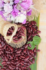 Red bean for health on wood background