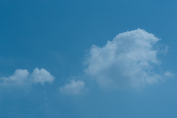 Air clouds in the blue sky.