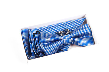 Blue bow tie with a pattern on a white background. Accessory for formal dress. Men's and women's accessories. Men's and women's bow tie. Hipster style