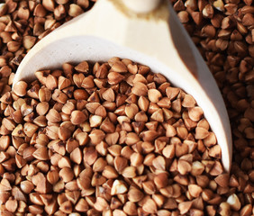 Buckwheat in a wooden spoon