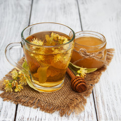 cup of herbal tea with linden flowers