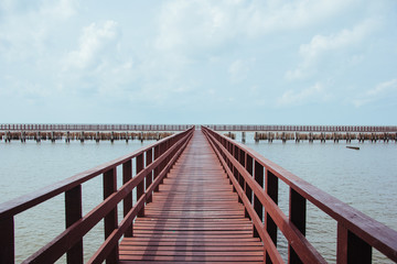 Obraz premium Wood bridge and seascape. Film Filter