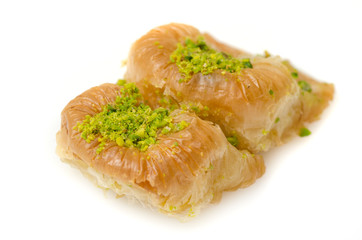 Baklava with pistachio on a white background