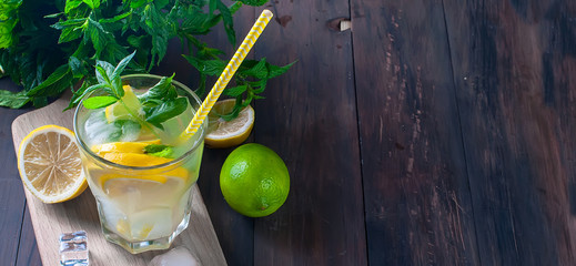 Lemonade in glass with ice and mint
