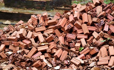 pile of old brown brick for background