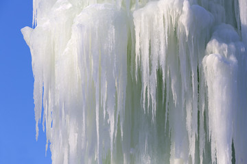 Icicles of ice in the winter of a frozen waterfall 