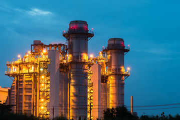 Oil refinery industry at sunset - factory - petrochemical plant