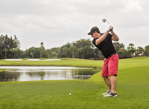 Man swinging golf club