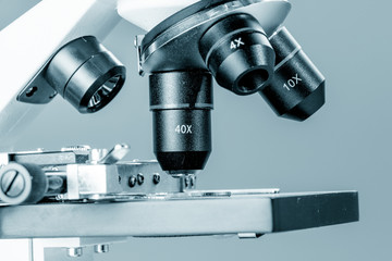 Subject table microscope and interchangeable lenses. Microscope is the main research tool in many scientific laboratories