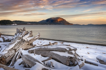 San Juan Islands Snowfall. Fresh snow blankets an island in the Puget Sound area of western...