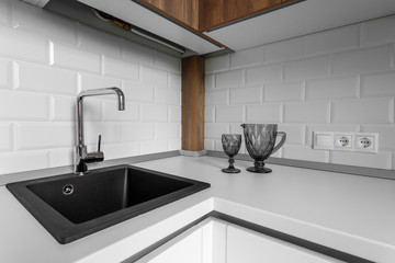 faucet and sink in the kitchen