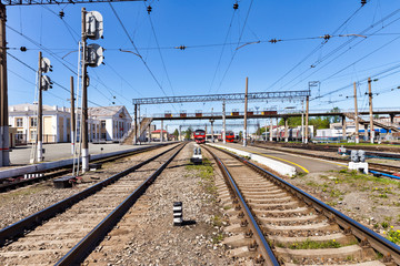 Fototapeta na wymiar Railway station on a bright summer day