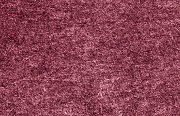 Pink color felt surface.