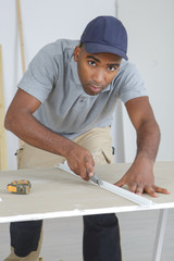 worker using a cutter