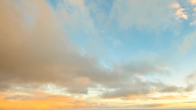 Blue sky with moving clouds time lapse from sunset changing light to dark above Waikiki Beach and Diamond Head from Tantalus Lookout. Oahu island, Hawaii, USA. Vacation and free travel concept.