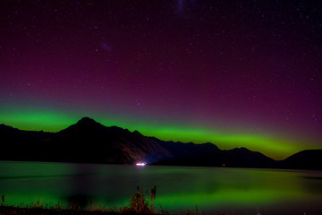 Beautiful Aurora Australis and milky way over Lake Wakatipu, Kinloch, New Zealand South Island