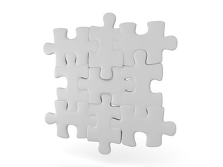 3D illustration of grey interlocking puzzle pieces
