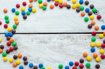 Colorful candies on white background