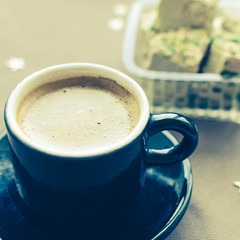Halva pistachio and cup of coffee