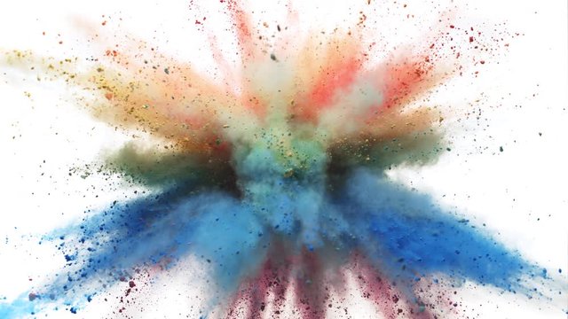 Colorful powder/particles fly after being exploded against white background. Shot with high speed camera, phantom flex 4K. Slow Motion. 