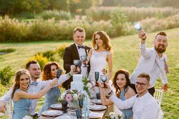 Wedding fiancee of the bride and groom with friends