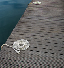 Dock and Rope in a Quiet Atmosphere on a Lake