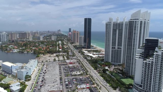 Aerial video Sunny Isles Beach highrise beachfront architecture