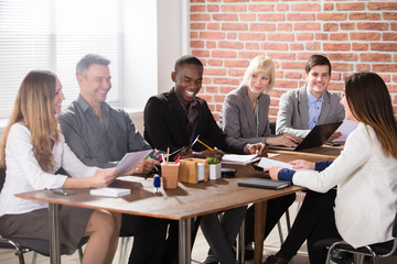 Business Team Discussing Successful Project