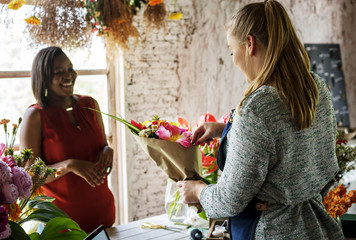 Flower shop business owner working service