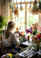 Flower shop business owner working service