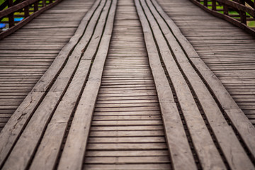 (Mon Bridge) Wooden bridge over the river in Sangkhlaburi District, Kanchanaburi, Thailand.