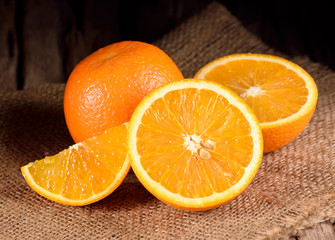 ripe oranges on wooden table