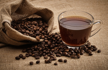 Cup of coffee and coffee beans