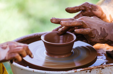 Master class on pottery, a close-up / The picture was taken in Russia, in the city of Orenburg, at the fair of the historical reconstruction festival 